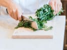 Cooking Class - Thai Favorites Made Healthy in Minneapolis: chopping cilantro for spring rolls