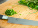 Cooking Class - Hors d'Oeuvres an Event Deserves in Downtown Dallas: chopping herbs