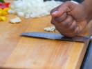 Cooking Class - Classic Brazilian Cuisine in Manhattan: chopping peppers onions and garlic