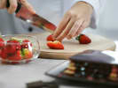 Cooking Class - Mastering The Cookout in South Bay & Peninsula: chopping strawberries