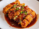 Cooking Class - From Gyoza to Donburi: Japanese Night in Vancouver: close up chicken katsu with sauce and scallions