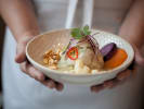 Cooking Class - Mexican Ceviche Feast: close up of person holding a bowl with fish ceviche