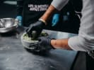 Team Building Cooking Class - Mexican Fiesta Dinner Team Building in Boston in Boston Proper: close up shot of making guacamole