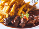 Cooking Class - Cook Timeless French Bistro Classics in Northern Virginia: close up of Ribeye steak with fries