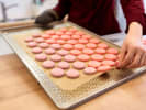 Cooking Class - Bake French Macarons at a Craft Distillery in Boston Proper: freshly baked pink berry macaron shells on a tray