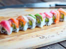 Cooking Class - Roll Colorful Sushi From Scratch in Baltimore: rainbow sushi on a wooden board