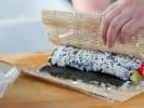 Cooking Class - Fun Sushi Making at a Local Brewery in Atlanta: rolling California sushi roll up close