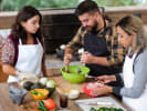 Team Building Cooking Class - Group Fiesta Feast: group of three people making guacamole and salsa