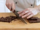 Cooking Class - Handcrafted Chocolate Truffles From Scratch in Dallas: Slicing Chocolate