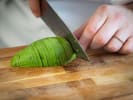 Cooking Class - Making Your Own Sushi in Orlando: chef thinly slicing avocado