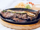 Cooking Class - Lively Latin Cuisine: carne asada with onion and bell peppers