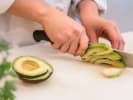 Cooking Class - Make Delicious Sushi Rolls in Alexandria: cutting avocado with precision knife skills