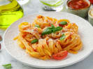 Cooking Class - Make Fettuccine From Scratch in Nashville: tomato sauce and parmesan cheese coated pasta