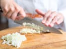 Cooking Class - German-Inspired Pasta Night in San Antonio: cutting onion