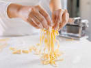 Cooking Class - Make Fresh Pasta With Marinara Sauce in Alexandria: making fettuccine pasta by hand
