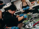 Cooking Class - Mexican Fiesta Dinner Night in Boston in Boston Proper: cooking class participants preparing guacamole