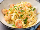 Team Building Cooking Class - Taste of Teamwork With Pasta in Boston Proper: a bowl of pasta with alfredo sauce and shrimp