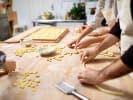 Team Building Cooking Class - Taste of Teamwork With Pasta in Boston Proper: group of people making pasta by hand