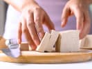 Cooking Class - Roll Creative Plant-Based Sushi in Addison: cutting tofu for sushi