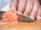 Cooking Class - Nigiri and Sashimi Sushi: chef slicing sushi grade salmon