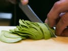 Cooking Class - Sushi Rolling Made Simple in La Jolla & Pacific Beach: cutting avocado with precision knife skills