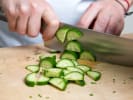 Cooking Class - Sushi Rolling Made Simple in La Jolla & Pacific Beach: cutting cucumber with a Japanese knife