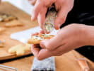 Team Building Cooking Class - Cookie Decorating in NYC: decorating cookies up close with sprinkles