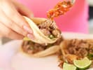 Team Building Cooking Class - The Ultimate Taco Battle - NYC in Manhattan: student making tacos