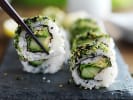 Cooking Class - Sensational Handmade Sushi in Nashville: picking a piece of vegetarian sushi with chopsticks