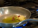 Cooking Class - The Best of Isan Thai Dining in Northern Suburbs: cooking garlic and oil