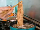 Cooking Class & Comedy - Chinese Culinary Feast in Downtown Chicago: cooking lo mein noodles