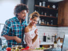 Online Couples Cooking Class - Knife Skills and Techniques: couple taking an online cooking class at hom copy