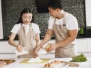 Cooking Class - Make an Elegant Dim Sum Dinner - Date Night in Northern Virginia: couple making dim sum dumplings together