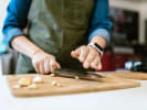Cooking Class - Wok Wonders of Szechuan Cuisine: crushing garlic