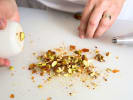 Cooking Class - Craft Dubaiâ€™s Viral Knafeh Bar in East Bay: crushing pistachios
