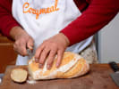 Cooking Class - Gourmet French Winter Comforts in Manhattan: cutting bread