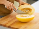 Cooking Class - Traditional Spanish Tapas and Paella: cutting cantaloupe melon