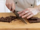 Cooking Class - Craft French Chocolate Cake in Downtown Dallas: cutting chocolate