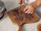 Cooking Class - Bake A Trio of Decadent Sweets in Dallas: cutting chocolate pieces