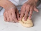 Cooking Class - Bake Caribbean Hand Pries From Scratch in Cambridge: cutting cinnamon rolls