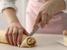 Cooking Class - Craft Cozy Holiday Bakes in Cambridge: cutting cinnamon rolls