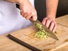 Cooking Class - Epic Sushi for Beginners in Charlotte: cutting cucumbers