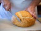 Cooking Class - Big-Time Bread Basics: cutting fresh bread