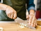 Cooking Class - Cucina Italiana: cutting garlic