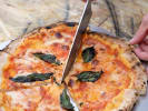 Cooking Class - New York Pizza Two Ways in San Francisco: cutting into homemade pizza