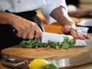 Cooking Class - Savoring Spanish Paella in Boulder: cutting kale