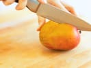 Cooking Class - Bun Voyage: Steamed Bun Delights: cutting mango