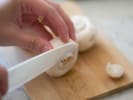 Cooking Class - Classic Parisian Fare in Queens: cutting mushrooms