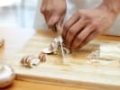Cooking Class - Beef Bourguignon 101 in Manhattan: cutting mushrooms