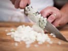 Cooking Class - Customized Curry in Edmonton: cutting onion